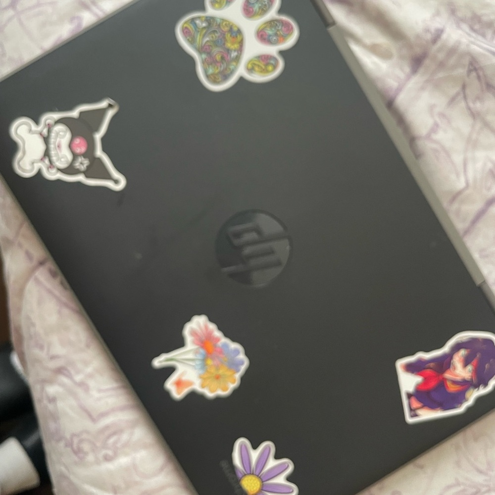 HP Laptop with Colorful Stickers